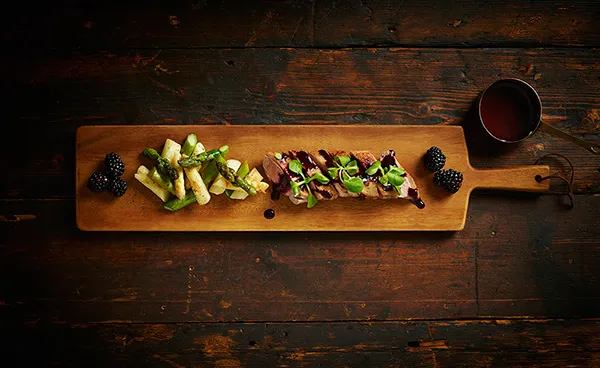 Pan-fried Duck Breast With Mixed White and Green Asparagus and Blackberry Sauce